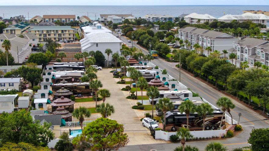 A few blocks from the BEACH in a nice convenient location close to the Community Pool. Located in Miramar Beach's Exclusive ''Class A Coach'' Non-Rental Gated Community of 15 lots with Palm Trees, sprinkler system, Pool & Pool House with Laundry, Restrooms & outside Showers. Lot 3 has a Screened Gazebo & Climatized Shed. Enjoy maintenance free living in a friendly Beach Community. Fees of $150 a month ($1800 a year) include Ground Keeping & Irrigation, private road maintenance, Security Gates, Insurance, Community Pool & Common facilities, Sewer/Water, Trash Disposal & Repairs/Maintenance. Owners Pay Electric & Cable. 2 Pet Limit. Close to bike/walking paths & public Beach Access by Pompano Joe's Restaurant. ONLY 'Class A Coaches' allowed. No 5th Wheels or Trailers. NO Rentals.
