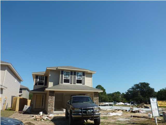 BE THE FIRST TO LIVE IN THIS BRAND NEW HOME - CONSTRUCTION NOW UNDERWAY! WELCOME TO BEAUTIFUL ''SUMMERWOOD'', A NEW SHALIMAR SUBDIVISION. SO MANY UPGRADES! *******THIS HOME FEATURES IMPACT GLASS WINDOWS.****** THE EXTERIOR OF THIS HOME HAS CLASSY STONE ACCENTS & DIMENSIONAL SHINGLED ROOF. ENERGY EFFICIENT & TOTAL ELECTRIC. ATTRACTIVE KITCHEN OFFERS STAINLESS STEEL APPLIANCES INCLUDING DISHWASHER, RANGE & MICROWAVE, PLUS QUALITY CABINETS, PANTRY AND GRANITE COUNTER TOPS. STAIN-RESISTANT CARPETING & CERAMIC TILE. RAISED PANEL COLONIAL DOORS. BATHS HAVE CULTURED MARBLE LAVATORIES. MASTER BATH HAS DOUBLE VANITIES, A GARDEN TUB, AND DUAL WALK-IN CLOSETS. SPACIOUS MASTER BEDROOM FEATURES A SITTING AREA, PERFECT FOR RELAXING WITH A BOOK. HUGE LIVING ROOM ON THE 1ST FLOOR, AND EITHER A 5TH