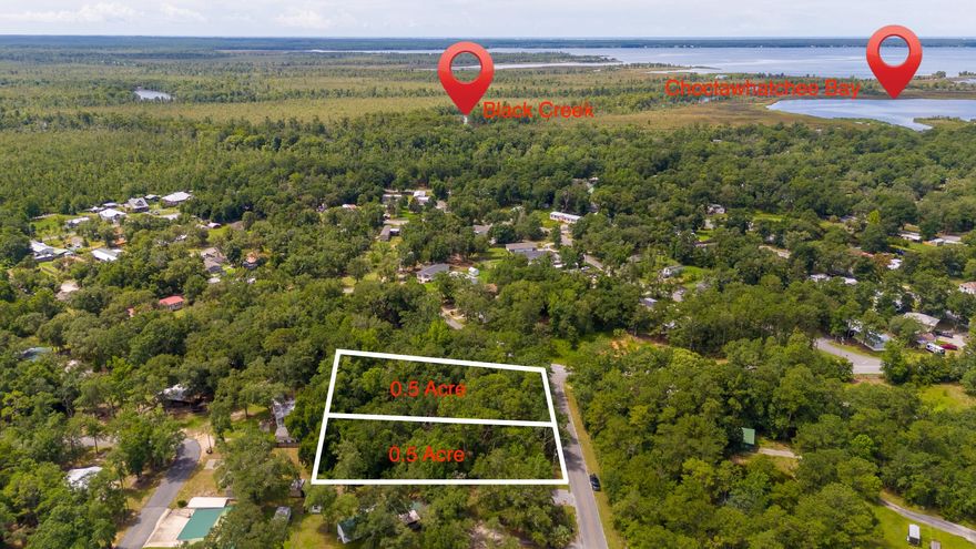 **Prime Lot Location at Black Creek! ** This beautiful, mulched, high-dry lot is in close proximity to Black Creek, which leads to the stunning Choctawhatchee Bay. You can enjoy sunrises and sunsets, fishing, boating, and camping to your heart's content! The property is located approximately 1.5 miles from the popular Black Creek Lodge and RV campground, a beloved destination for years. Black Creek Lodge features a large boat ramp that locals can use for a nominal fee.If you're searching for a comfortable and relaxing spot to establish your dream home or a fantastic retreat, this is it! The property has minimal restrictions, no HOA, is zoned as Rural Residential, and is located in Flood Zone X. This lot truly checks all the boxes! Conveniently, it's just 20 minutes from the world-famous sandy white beaches of Florida's Emerald Gulf Coast. You'll also find plenty of natural beauty, with numerous state parks, springs, and rivers nearby.

The property requires a septic tank, but public water is available (tap fee paid by the seller). The sellers understand that a grant has been issued to bring sewer services to this area in the future, but it's advisable to check with the City of Freeport for confirmation on timelines.

Buyers should perform due diligence regarding building codes and zoning regulations with the appropriate local authorities to ensure the property can be used as intended. While the information in this listing is deemed accurate, it is not guaranteed.

Lot 11 is also available creating over an acre of land. Seize this rare opportunity today! 
