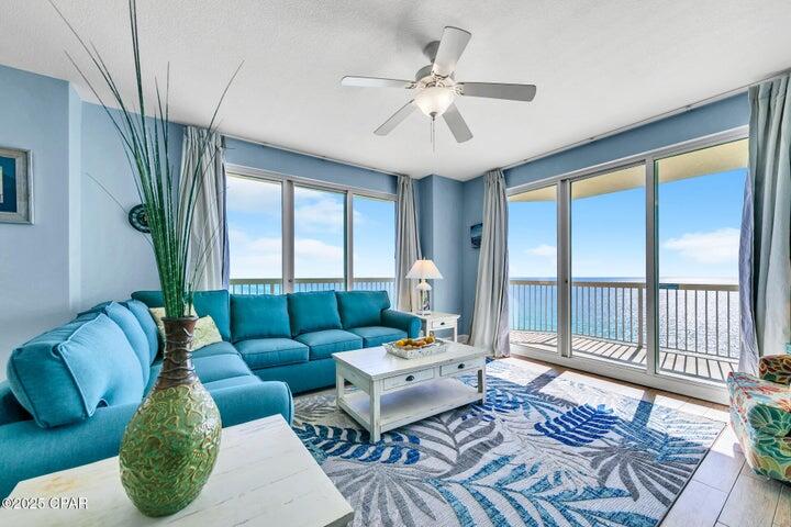 This incredible Gulf front east end corner unit has a large wraparound balcony with breathtaking views of the Gulf of Mexico and beautiful white sandy beaches. Property features include a spacious and open floor plan, high ceilings, and ceramic plank tile floors throughout the entire unit. Large glass windows and doors span across the living area to maximize the views. The sunrise and sunset views from the 46' private, eastern facing, wrap-around balcony are a perfect end to a sunny day and beginning to an exciting evening - the ultimate in alfresco living! The kitchen is upgraded with granite countertops and breakfast bar. The master bedroom is gulf front and has direct balcony access and a large garden tub in the en-suite master bath complete with dual walk-in closets. There is a washer & dryer in the unit, and it is being sold fully furnished with modern beach decor. Meticulously maintained! Updates in 2024 include fresh paint, new sleeper sofa, and new ploy-wood balcony furniture! Condo also conveys with an additional exterior storage room on the same floor and near the elevators. This income generating property will convey turnkey and rental ready! Sunrise Beach offers its residents hundreds of feet of dedicated beach, covered parking garage under the building, on-site gym, two pools and hot tubs, and children's water play area. You're also walking distance to many restaurants and just a 3 minute drive to Pier Park. Underbuilding parking is as convenient as it gets. Sunrise Beach Resort is one of the most attractive Gulf Front condominiums in Panama City Beach and has one of the best locations on Front Beach Road. FOUR HIGH-SPEED ELEVATORS serve 221 condos which is one of the best ratio of elevator/condo on the beach. Also, PARKING IS UNDER THE BUILDING, no long walk-over every time you park. Centrally located to all the dining and entertainment PCB is famous for including spas, shopping, golf, fishing and more! Sunrise Beach has amazing amenities, including: 346 feet on the Gulf of Mexico, 2 Gulf front swimming pools (one is heated), 2 Gulf front spas, children's splash pad, Gulf front exercise room, catering kitchen, private theatre room with 50 inch plasma TV, private clubhouse, covered parking in garage under the building (you don't have walk across the street), , BBQ area with gas grills and more! Sunrise Beach is owner controlled which means the homeowners own the gym, the pools, and receive the income from the Beach Chairs, etc!