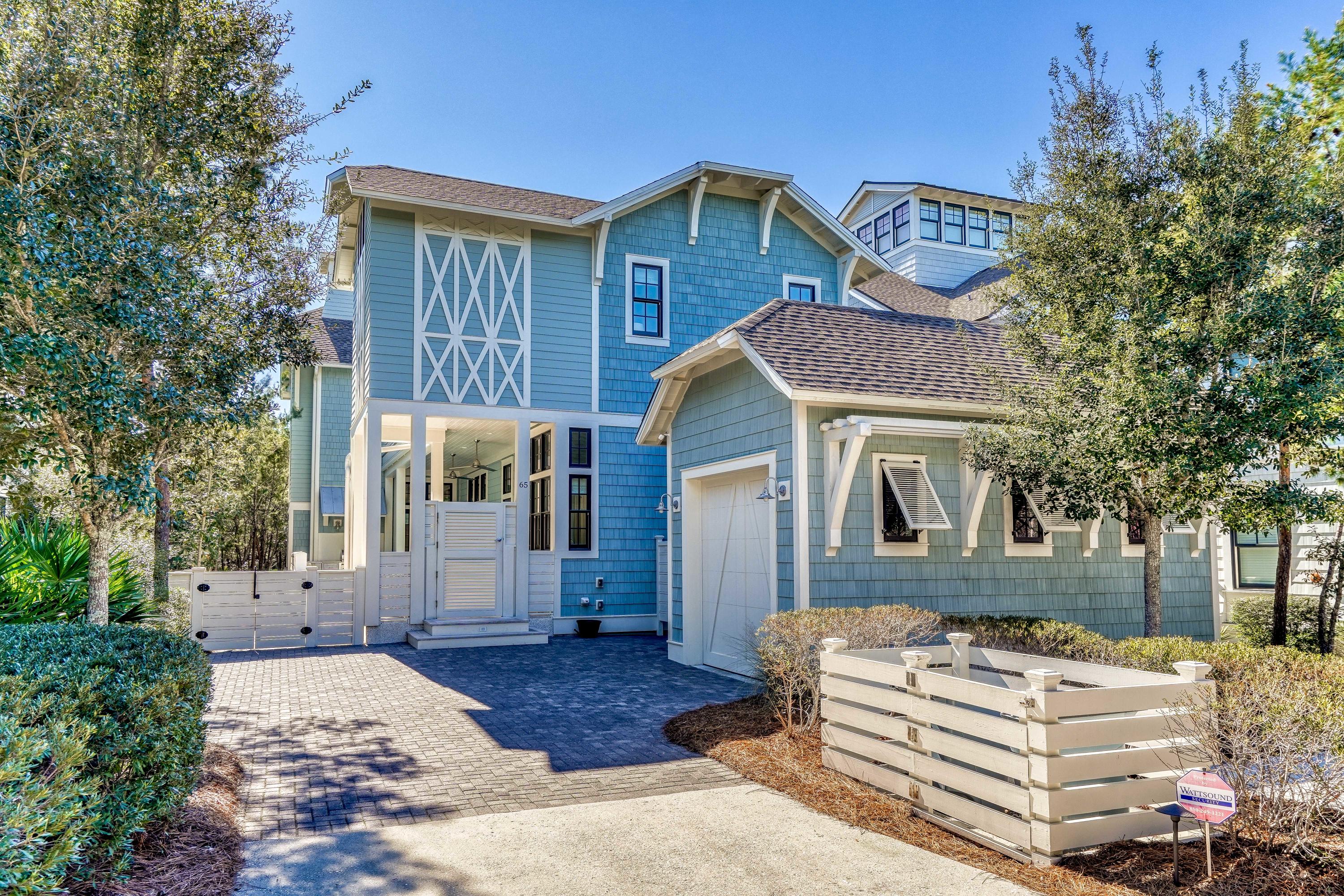 This custom designed residence in WaterSound Beach is  sure to impress. Upon entering this amazing home one immediately appreciates the extraordinary use of skillful millwork and craftsmanship evident in the custom trim, moldings, doors and 14 foot ceilings. There is a multitude of natural light coming through the plethora of windows. This private outdoor retreat is complete with private pool and covered summer kitchen. All of these upgrades truly set the tone for a gracious, relaxed ambience which is found throughout this one of a kind, unique and inspired beach home.