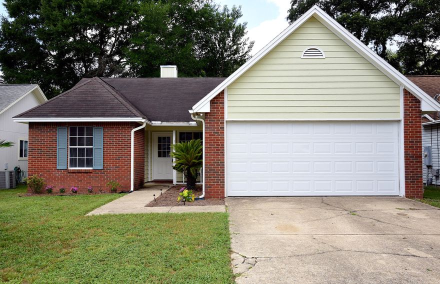 Charming family home in a quiet Bluewater Bay neighborhood.3 Bedroom, 2 bath traditional home 5 minutes from the Mid Bay Bridge and all that Destin has to offer. This home features vaulted ceilings with a fireplace in large living room. A sun-filled kitchen just off the living room with a separate dining area that looks out into the privacy fenced backyard. Split floor plan showcasing a master suite with a walk-in closet, separate toilet and a double vanity. This home won't be on the market for long, so call/text for your showing today!