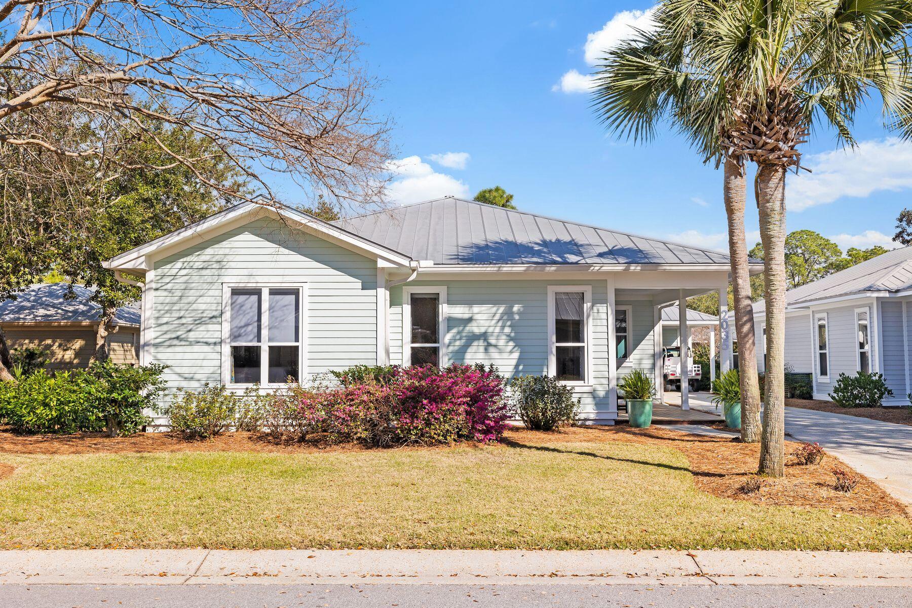 Located within the exclusive Sandestin Golf and Beach Resort, this beautifully updated home in Crystal Lake offers a rare opportunity for full-time residents and second-homeowners seeking a peaceful coastal retreat, with no short-term rentals permitted. Thoughtfully designed with a spacious, single-level floor plan, this four-bedroom, three-bathroom cottage is a showcase of elegant upgrades and meticulous craftsmanship.  Travertine flooring flows throughout the common areas, complemented by newly installed luxury vinyl plank in the bedrooms. The expansive kitchen is designed for both function and style, featuring custom soft-close cabinetry, a professional-grade KitchenAid appliance suite, Sharp microwave drawer, a pro-style gas range and stunning Oceanside glass tile backsplash. Windows flanking the range bring in natural light, while a well-appointed island with a beverage fridge and prep sink enhances the space for entertaining. A bright and airy living area leads seamlessly to the screened back porch, complete with updated electrical and cable for outdoor relaxation.  

The primary suite is a private retreat with designer drapery and wallpaper, solar shades and a newly renovated spa-inspired bathroom featuring a Kohler whirlpool tub, frameless glass shower and custom vanities. Two additional guest bedrooms and bathrooms have been completely transformed with new tile surrounds, high-end fixtures and designer finishes.  

No detail has been overlooked, with recent improvements including a whole-house generator, upgraded electrical panel, new insulation, new ceiling fans, a tankless water heater, and premium lighting and hardware throughout. The laundry room was refreshed with new cabinetry, designer wallpaper and LED light fixtures. Outside, fresh exterior paint, new front decking, new fans with LED lighting on the rear porch and updated landscaping complete the home's polished aesthetic.  

Residents of Crystal Lake enjoy access to an array of resort-style amenities, including multiple pools, private beach access, championship golf courses, tennis and pickleball courts, a full-service marina, and miles of walking and biking trails. The Sandestin lifestyle offers everything from world-class dining and shopping at Grand Boulevard to golf cart access to the hospital, making this home an unmatched option for those seeking both luxury and convenience in a vibrant, gated community.