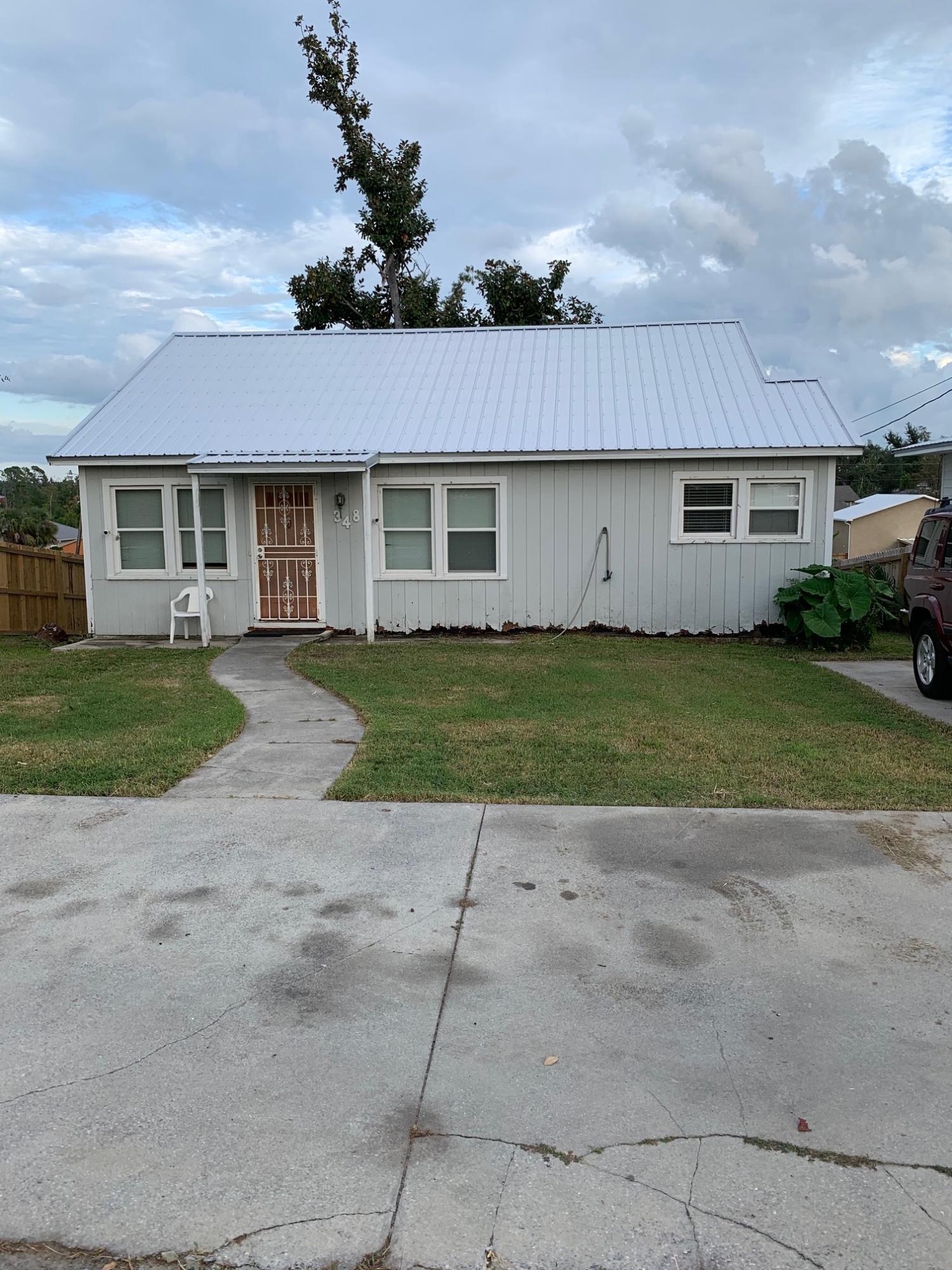 Are you ready to take this house in the Cove and make it your own? This fixer upper features 2 bedrooms and 1 bath with a basement below and a deck in the back. The property can also be accessed from the back alley access. It convenient to Downtown, Panama City Beach, and Tyndall Air Force Base. Don't miss this opportunity!Clarification: The property only has 2 bedrooms and 1 bath. There is a toilet in the basement, but it is not counted as a bath because is does not have a sink nor a bath to go with it.