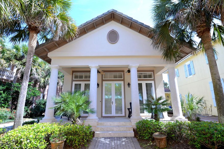 CHARM GALORE  ALL NEW HARD STUCCO AS OF FEBRUARY 2019! Charming Caribbean home in beautiful gated Caribe neighborhood. Ideal floor plan with master suite down. Doors from master bedroom lead to a private back yard garden area. A nice shed for yard equipment, etc. is also located in the back side yard. The first floor houses the living/dining area, kitchen, half bath, laundry room, & master suite. Upstairs there are two bedrooms & a guest bath. Each guest bedroom has a small balcony. Other amenities include plantation shutters, crown molding, raised ceilings, & fireplace in the living room. The house is located on the northeast side of the cove on Rue Martine. Caribe is a private guard gated gulf-front community with two neighborhood pools, tennis courts, a large lake with