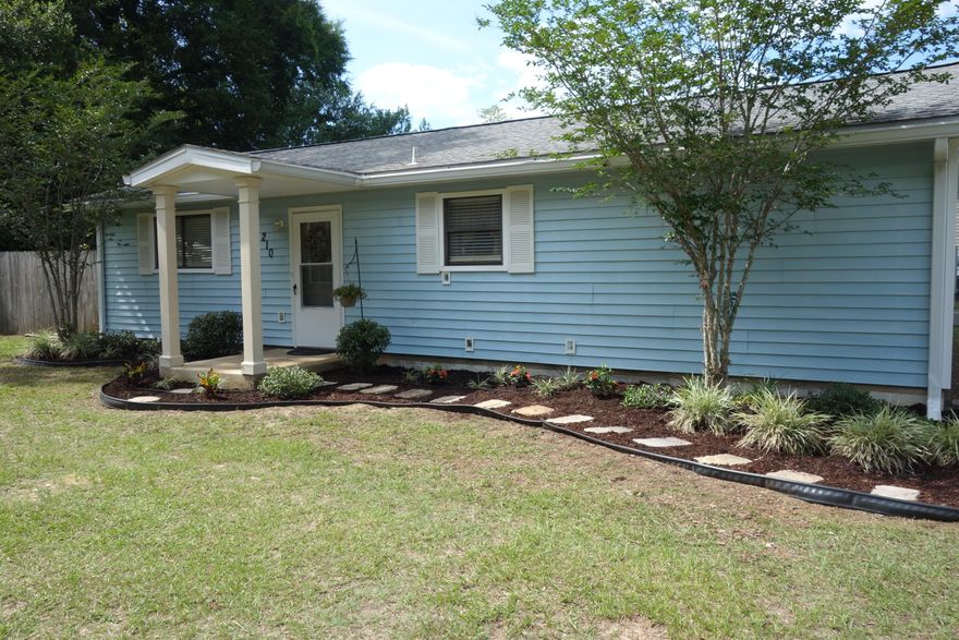 This move-in ready 3 bdrm/2 bath home features an open-concept LR/DR/KIT space and split Bdrms located on a large corner lot with a fenced backyard and 10x12 deck. The front yard is nicely landscaped while the interior offers many upgrades such as wood-like, vinyl-plank floors and carpeted bedrooms, an arced hall entrance, 5 1/2'' floor molding with new doors and trim, newer kit. Countertops and appliances including a dishwasher and disposal, and ceiling fans throughout. An outside shed on a concrete pad provides extra storage space. This is a perfect starter home or income property.