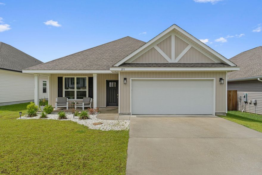 Welcome to 253 Camellia Dr in the desirable Mahogany Woods community!Built in 2023, this beautifully maintained 3-bedroom, 2.5-bath home with a bonus room offers modern comfort and thoughtful design in every corner. With 9-foot ceilings throughout, the home feels spacious and inviting from the moment you walk in.The heart of the home features a stunning open-concept layout with granite countertops, stainless steel appliances, and a large island perfect for gathering. The tray ceilings in both the living room and master bedroom add an elegant touch of architectural interest.The split-bedroom floor plan provides added privacy, with a spacious master suite that boasts a large walk-in closet, dual vanities, soaking garden tub, and separate shower. The bonus room adds versatility-- perfect for a home office, playroom, or guest space.
Step outside to a covered back porch overlooking the fully privacy-fenced backyard. This home also features solar panels, helping reduce your energy costs while supporting a more efficient lifestyle.