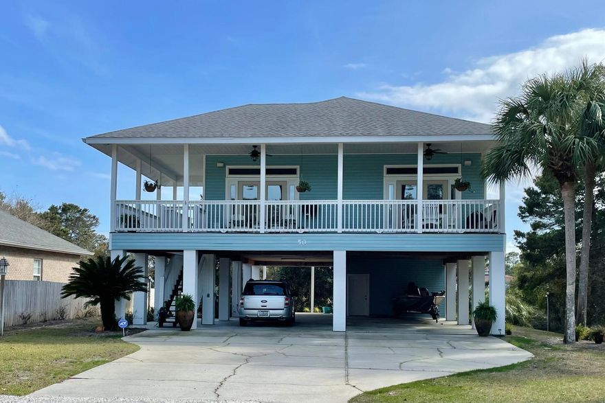 Cute 2 bed/2 bath beach cottage in prime location 3 blocks from the beach. Large lot for pool and carriage house and on tall pilings for expansion under existing home. Peek a boo gulf views from rear of house. Floors hand scraped birch, kitchen opens to living, large front porch, large closets for storage. Immaculately kept and never rented.