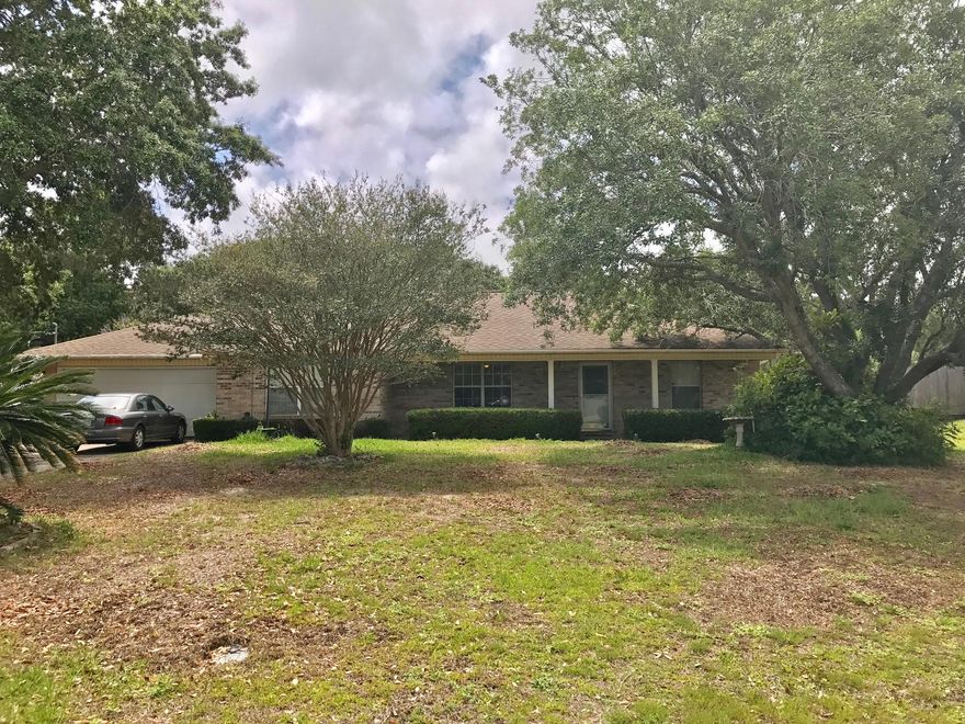Location, Location, Location! Centrally located in Navarre, close to shopping and schools. 3 Bedrooms and 3 bathrooms, features: an addition that was completed in 2007 that include a large Master Suite, office and covered back porch. Tile floors in the living area, kitchen and bathrooms. Carpeted in 2 bedrooms. Schedule your appointment today!