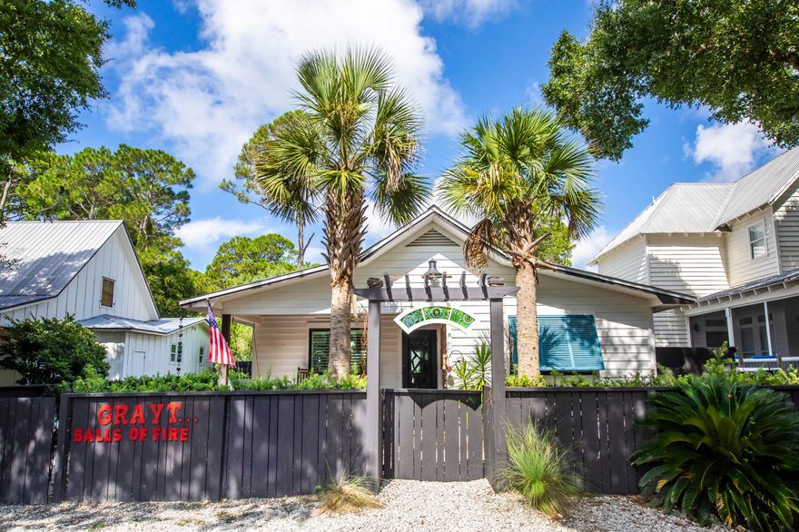 Exuding the authentic spirit of Grayton Beach that few properties have ever emulated, this fully renovated home is a rare blend of Old Florida charm and European sophistication. Tucked beneath native trees and lush tropical landscaping, it offers a true sense of privacy while remaining just a short stroll from the Gulf, renowned restaurants, and Grayton's vibrant artistic shops.The backyard feels like a private resort, complete with a water fountain feeding into a sparkling pool, tropical plantings, an outdoor fireplace, and multiple covered porches and decks designed for effortless indoor-outdoor living. Inside, natural light floods an open, airy floor plan that includes a spacious living area, 2 primary suites, dining room, and updated kitchen--all perfectly suited for entertaining. Two separate bedroom suites overlook the pool, each with a private bath, creating serene retreats for family and guests.

Recent updates ensure peace of mind, including impact-rated doors and windows, a new roof, and a whole-house natural gas generator. The fenced yard is both pet-friendly and family-ready, with ample parking for up to five vehicles.

24 Magnolia is a modern Grayton classicsophisticated yet inviting, thoughtfully designed for coastal living, and infused with the timeless character that makes Grayton Beach unlike anywhere else.