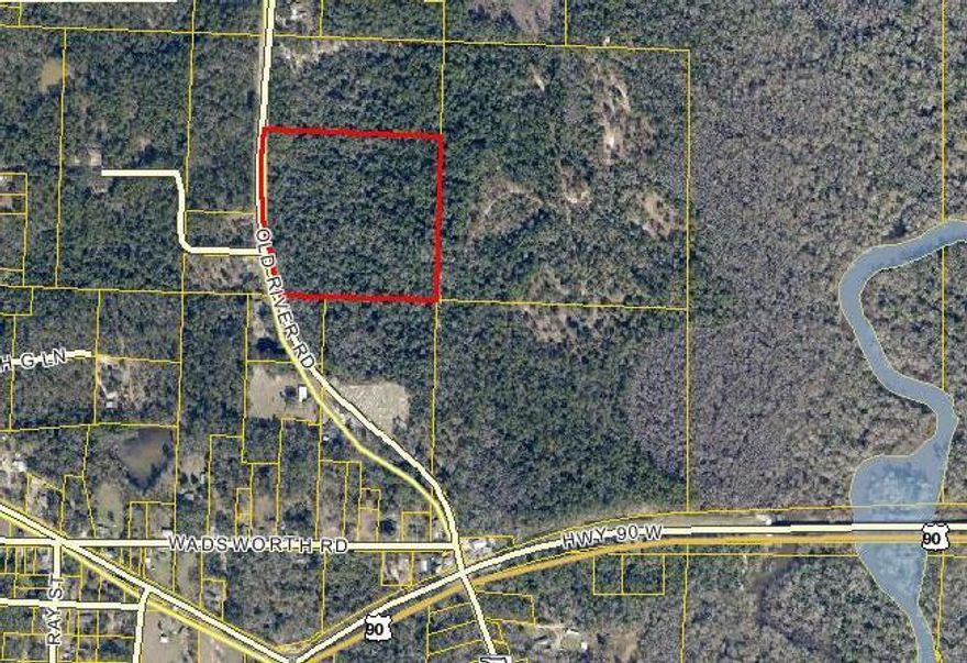 Heavily wooded with mature trees located on Old River Road. The property slopes from the road and the back portion of the property is in the AE Flood Zone. See the documents section.