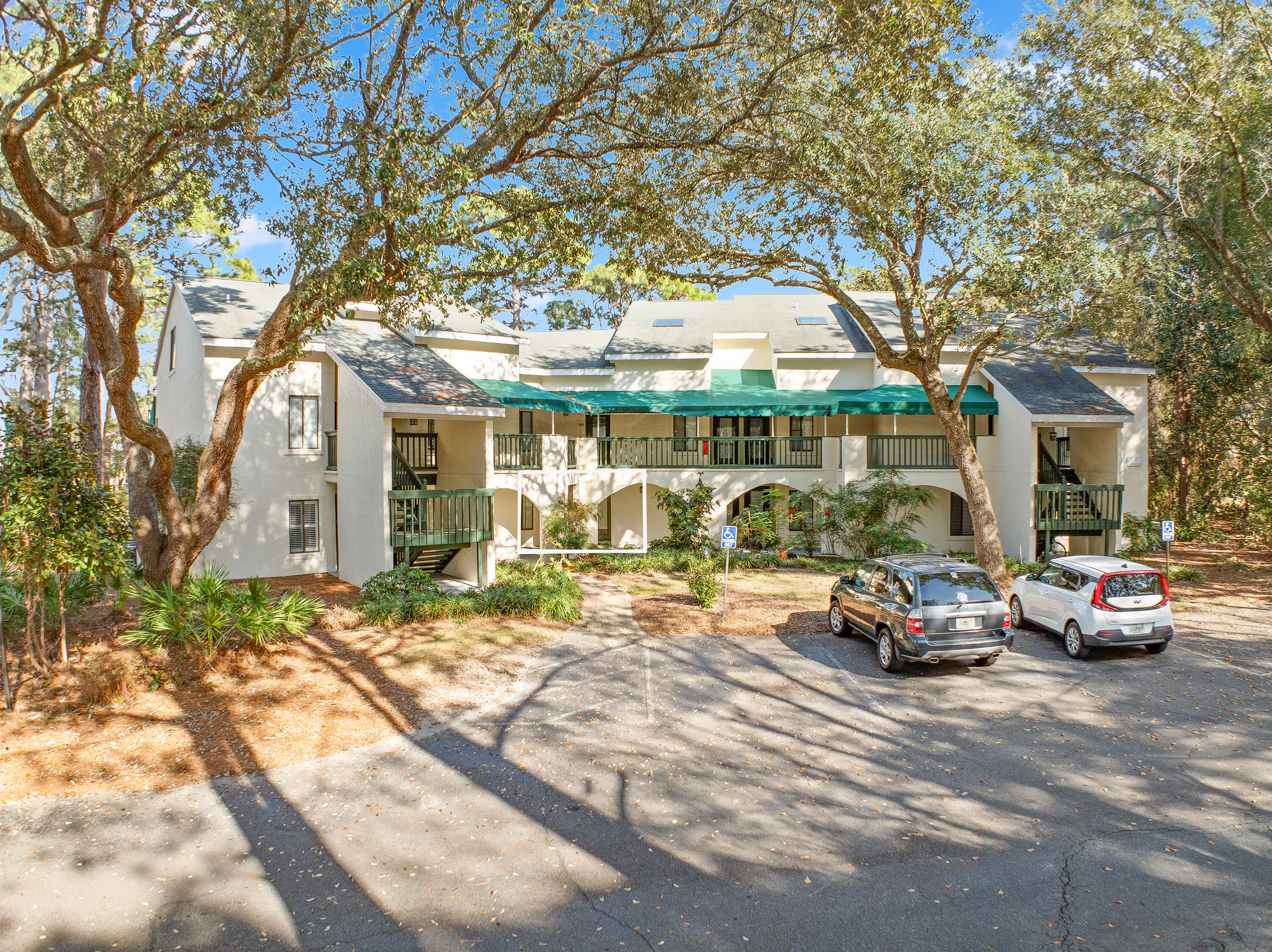 Welcome to your serene oasis at Lakeside Condo at Bluewater Bay in Niceville, Florida. This condo offers a perfect blend of comfort and elegance all while boasting gorgeous views of the lake. This ground floor unit has it's advantages of like having your own huge backyard with your very own lake. This spacious living room features a cozy seating arrangement, ideal for relaxing after a sun soaked adventure outdoors with family and friends building lifelong memories, making it the perfect retreat for both relaxation and entertainment.This unit has New cabinets & new granite countertops in the kitchen & bathrooms as well & Tile flooring throughout.Take a leisurely stroll along the scenic paths that wind through the lush landscape surrounding the lake.