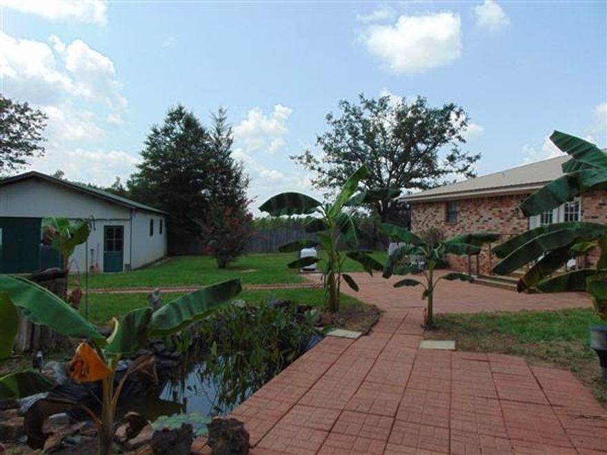 Affordable brick home South of I-10 on 1+ acre lot with fenced back yard, storage shed and apx. 24x30 detached garage/workshop. New metal roof installed in August 2015. Home is centrally located between Defuniak Springs and Freeport. Also, 20 minutes to the Beaches of S Walton. This could also be a great location for a home-based business being located just off Hwy 331 S. Interior of home has open floor plan and split bedrooms; Nice sized laundry room; Laminate flooring in bedrooms and tile through the remaining of the home. Spacious master bedroom/bath has walk-in closet and double vanities. Back yard nicely landscaped. Schedule your showing today!