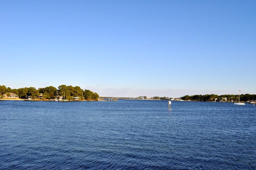 Exceptional ground floor unit with expansive views of Cinco Bayou from the deck and master bedroom. Tile flooring, stainless steel appliances, granite countertops and carpeting in the both bedrooms! This unit is located next to the pool and clubhouse, which you may access at most any time with your very own key. The unit also includes a deep-water boat slip with it's own boat lift, with water availability! Laguna Landing is located in central Fort Walton Beach with easy access to Hurlburt Field and Eglin Air Force Base, as well as, area beaches, dining, shopping and more!