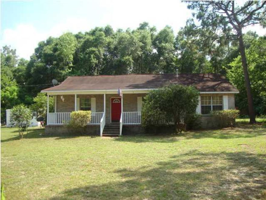 REO Country living with easy commute to Eglin,7SFG, beaches and shopping. Home sits on one acre this home has space for the garden, cars, boat and the family. Ranch style home features large front porch, 3 bedrooms 2 bath, laundry room, wood burning fireplace and much more. Large eat in kitchen with plenty of cabinets and counter space with bar. The 3rd bedroom with fireplace that is adjacent to the kitchen can also be used as a large family room/den. Screened porch overlooks patio and private wooded yard. Master bedroom has built in shelving for books, audio system, or just collectibles. Take a look today.