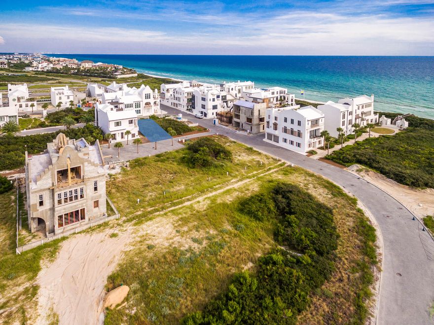 One of the most desirable locations Beach side on 30A is now offered for purchase. This magnificent Alys Beach homesite offering is one of the remaining sites literally steps to the beach with access through the beautiful Gulf Green. The homesite fronts on South Charles Street bordered by a pedestrian path to the North. This homesite is one of few two-car garage and two additional parking court spaces available. Join the momentum as spectacular homes are being constructed and completed in this awe-inspiring town. Rooftop terraces are allowed on this property and can be a favorite gathering spot for entertaining under the stars.Savoie Architects have drawn an amazing set of approved, completed plans which can be purchased in addition to the price of the homesite.