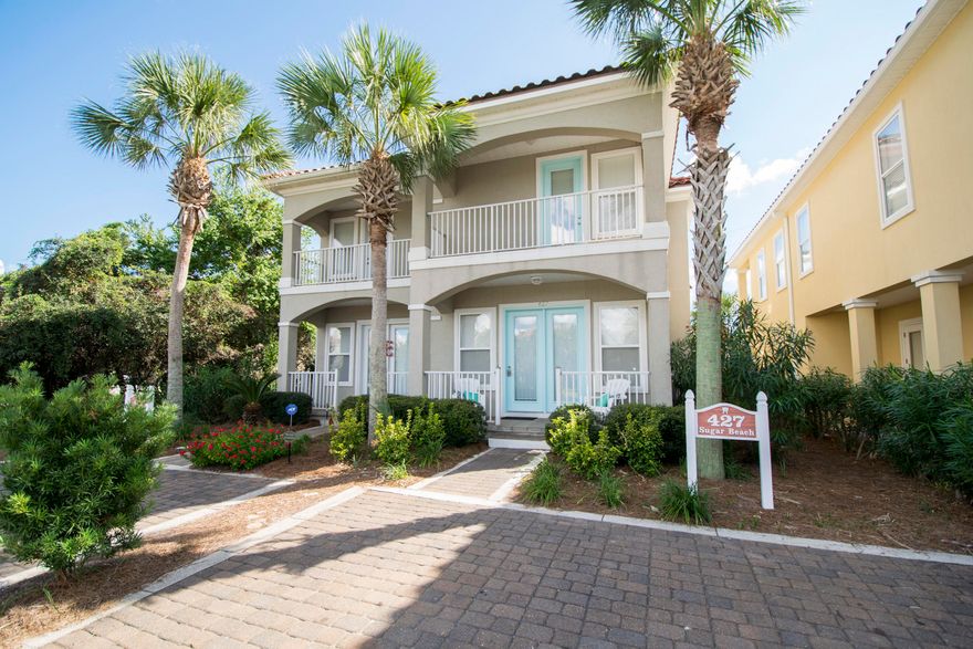 GULF VIEWS from two floors! Beautiful vacation home located in La Valencia Beach Resort conveniently located on the far west end of PCB. Gated community with Tennis Cts, Private Owners heated and Gated Pool and for all Owners and Guests a gated BEACH FRONT community pool...only community in PCB with with this fabulous amenity. ''SUGAR BEACH'' is located directly across the street from the beach. This 3 story home has a luxurious coastal feel featuring TWO Master suites with private balconies, one located on the 1st floor and the main master located on the 2nd floor. Two additional queen bedrooms (3rd floor is also a great hang out room too) and two over sized built in BUNKS! Home comfortably sleeps 12 (both LR sofa and 3rd floor comfy sofas are queen sleepers).