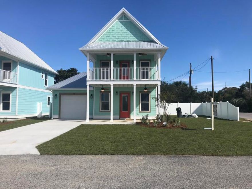 Brand new Beach house! This 2 story beauty is waiting for You. From the second floor balcony, you havelake and Gulf views. Shiplap walls adorn the den and master bedroom.Tile baths. Huge kitchen, with an oversized granite top island. Above grade waterproof vinyl plank flooring. Custom built wood cabinets and vanities. 10 foot ceilings. High wind impact windows & 8 foot doors throughout. Extra large Garage for vehicle, golf carts, and plenty of storage. Outside private shower with hot & cold water.Beautiful landscaping with a white vinyl fence.Irrigation system to nourish the outdoor plants and grass. And look next door to see the fraternal twin of this house. Don't miss out on this great beach home.