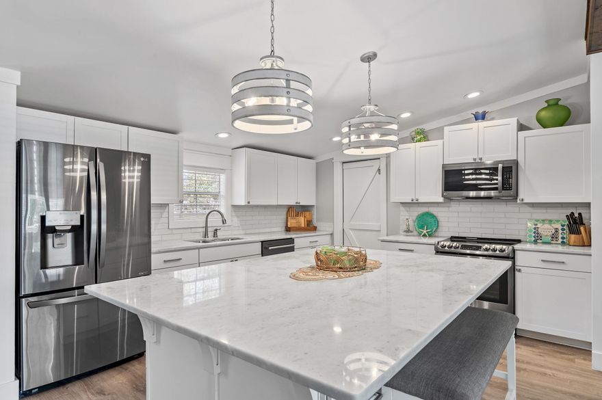 Immaculate, move-in ready home south of 98 in Santa Rosa Beach! This charming 3 bed, 2 bath home sits on a spacious .27-acre lot just one turn and 5 minutes from the beach. Enjoy the welcoming front porch, added garage, and open-concept layout with spacious living and dining area. The updated kitchen features a modern farmhouse look and stainless steel appliances--perfect for any home chef. Bedrooms are generously sized, and both bathrooms have been stylishly renovated. Conveniently located near 30A, Grand Boulevard, Baytowne Wharf, and more. Minimum rental is 6 months or longer--perfect as a full-time home or long-term investment!