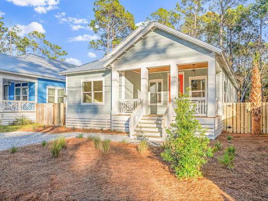 This brand-new beach home offers the perfect blend of luxury and coastal charm, making it an ideal choice for those seeking the Emerald Coast lifestyle. It is positioned in a prime location just 3,000 feet from the Cessna Landing boat ramp to Choctawhatchee Bay and only two miles from the breathtaking white sand beaches.Designed to impress, this home features an open-concept layout with vaulted ceilings and elegant wooden beams, creating a delightful atmosphere throughout the living, dining, and kitchen areas. The kitchen boasts soft-close cabinets and quartz countertops, offering both style and functionality. The living room is a welcoming space where you can gather with family and friends or unwind by the fireplace for a cozy evening. The master suite is a true retreat, showcasing a tray ceiling accented with rich wooden beams for a refined touch, and a spa-like bathroom, adorned with marble flooring and tiles, a double-sink vanity, and a sleek glass walk-in shower. Additional features include a spacious laundry room for convenience, and an innovative instantaneous water heater that ensures energy efficiency without compromising comfort. Outdoor living is just as spectacular, with spacious verandahs at both the front and back of the home, offering plenty of room to relax and soak in the coastal breeze with a fenced backyard that provides privacy.
Whether you're looking to create a steady rental income or embrace the laid-back beach lifestyle, this home presents a remarkable opportunity for coastal living at its finest.