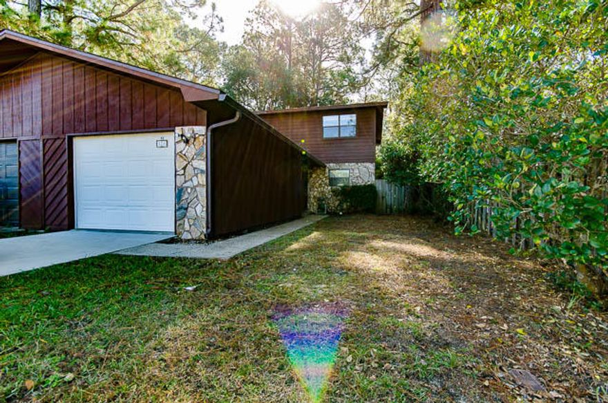 AMAZING PRICE!!! Priced to Sell!! 3 Bedroom 2.5 Bath Town Home!! New Tile downstairs! Spacious living room & kitchen! Fireplace. Fenced in back yard. MOVE IN READY!!