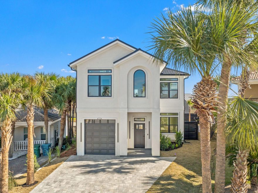 Modern coastal new construction with a private pool in the desirable Terra Cotta Terrace community of Destin. This thoughtfully designed home features an open-concept floor plan with recessed lighting and abundant natural light throughout. The designer kitchen offers custom cabinetry, dramatic stone countertops, a farmhouse sink and stainless steel appliances. Well-appointed bedrooms include custom bunk beds and flexible sleeping spaces ideal for guests or family. Spa-inspired bathrooms feature illuminated mirrors and designer tile. Enjoy seamless indoor-outdoor living with a fully fenced backyard, in-ground pool, and paver deck. The home is complete with a contemporary stair railing, dedicated laundry area, and modern exterior. Convenient to beaches, dining and shopping.