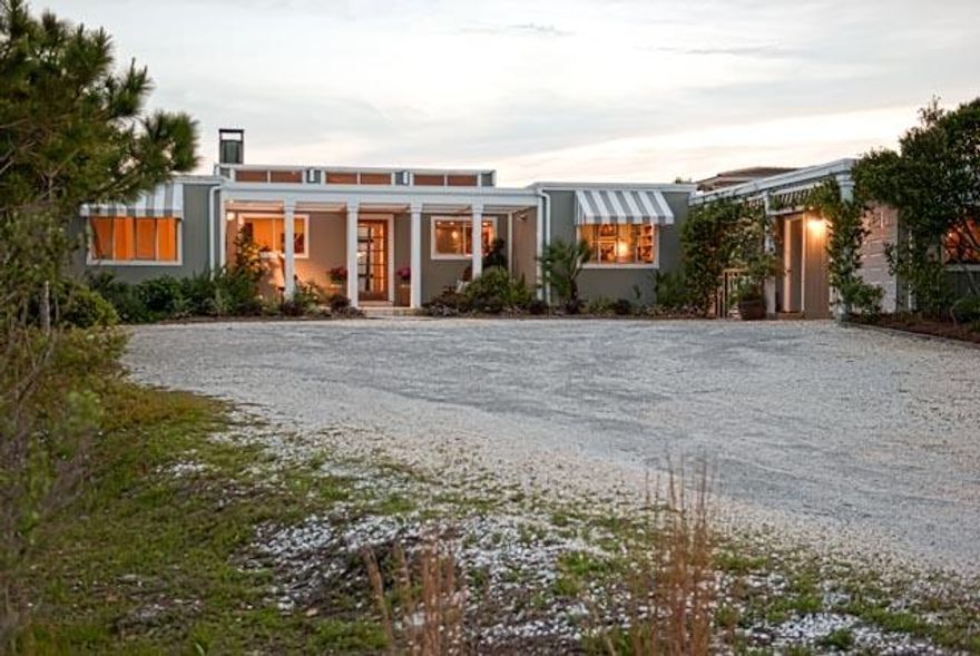 One of the largest lots in one of the most fabulous settings in all of Walton County...Discover the undiscovered! This home sits on 1.73 acres and offers expansive views overlooking the beautiful sand dune landscape and the Gulf of Mexico...Home has been updated including kitchens and baths...Large fenced pool and courtyard; Large screened porch; and decks along the full width of south side of the home provides exceptional and expansive views to the Gulf. Plenty of room to expand...Can have home of up to 9000 sq ft...Four Mile Village is a unique community bordered by the Coffeen Nature Preserve on the north and the Gulf of Mexico to the South and Tops'l Hill State Park to the east...Live in and enjoy the history of this this 350 acre Coffeen Nature Preserve.