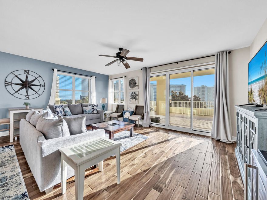 SELLER OFFERING $10kTOWARDS BUYER CLOSING COSTS! This fully furnished, 3-bedroom, corner unit offers spacious accommodations, perfect for families seeking a beach getaway. Upon entering the condo, you're greeted by a bright and airy living space with tasteful coastal decor. The open-concept layout seamlessly connects the living, dining, & kitchen areas, creating a perfect space for socializing & entertaining. Large windows & sliding glass doors offer plenty of natural light to fill the space. The living room features comfortable seating and access to a private, oversized balcony. The fully equipped kitchen boasts stainless steel appliances, granite countertops, backsplash, wine cooler, pantry, and ample cabinet space, making meal preparation & entertaining enjoyable!  The master bedroom is located just off the living area and features an en-suite bathroom that has a tub and separate shower. Both guest rooms feature ensuite bathrooms for maximum convenience and privacy. Another private balcony is located off of one of the guest bedrooms. This unit features tile and wood flooring throughout. NO CARPET! Ariel Dunes II offers two large pools and a fitness center. Seascape amenities include a 18-hole golf course, pickleball, tennis, bike rentals, and much more! 2000 feet of deeded beach access - You won't have to fight the crowds. 
You never have to leave the resort with the Towne Centre, featuring several restaurants, a coffee shop, and other entertainment. Cabana Caf??, a local restaurant and bar is located at neighboring condo, Ariel Dunes I. This condo is located just a 1/2 mile to the Silver Sands Outlets, 3 miles to Grand Blvd. and 3.5 miles to The Destin Commons. Start enjoying the beach lifestyle while owning at Ariel Dunes II, located within the gated, 300 acre, community of Seascape.