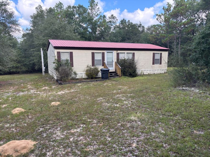 Here is your opportunity to own your piece of paradise in North Walton County. Almost 10 acres with a manufactured home ready to make yours. This is a beautiful piece of property in a very quiet area of North Walton. Home is being sold As Is. Buyer should verify any information they feel is pertinent.