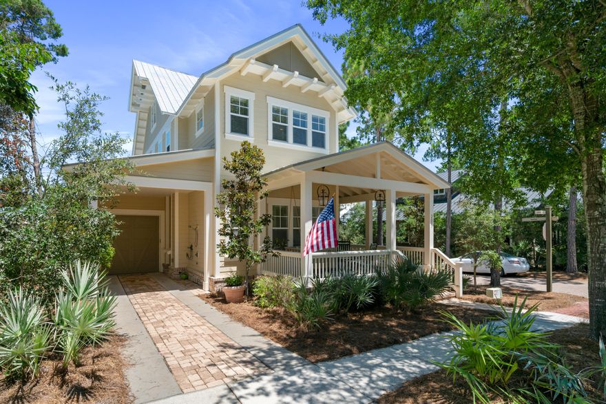 Welcome to southern cottage life with a coastal vibe.  This home built by Luke & Blues is located on a prime corner in Forest Lakes and has many windows allowing for lots of natural light and brightness. Being sold by the original owner and is a primary residence and has never been rented.  The mature trees and brick paver streets of the neighborhood encourage you to wander the community and to enjoy the pool, green space and playground areas.  Also, an easy walk to the closest public beach access.  This 4 Bedroom, 3.5 Bath home feels much larger than its total square footage because of the open floor plan and light neutral colors.  The entire home has natural pine plank floors with the exception of tile in the bathrooms. An extra large island in the kitchen is the perfect spot for extra seating, food prep and even a buffet.  The pantry is adjacent to the kitchen and has space for food storage as well as small appliances.  The attached garage is large enough for a golf cart, bikes and even beach chairs and toys.  A jack & jill bathroom connected to two bedrooms upstairs makes this space unique and functional.  A perfect spot to relax is on the front porch swing under the glow of the gas lights.
