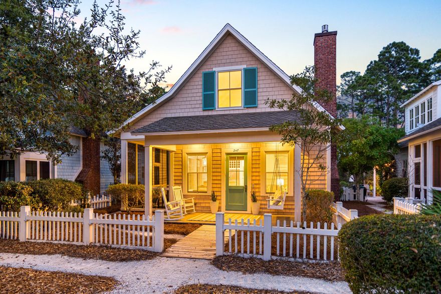 This charming beach cottage in the highly coveted Watersound Beach community boasts two generously sized bedrooms and three full bathrooms. The first floor impresses with Pacific Shell Stone flooring and soaring 18-foot ceilings, while the well-appointed kitchen dazzles with custom features including Carrera marble countertops, Kohler stainless sink & faucet, under-cabinet lighting, and stainless-steel appliances. The master suite offers a peaceful retreat with its high vaulted ceilings, providing an ideal space to unwind after a fun day at the beach or pool. The upstairs features an ensuite guest bedroom, offering additional comfort and privacy.