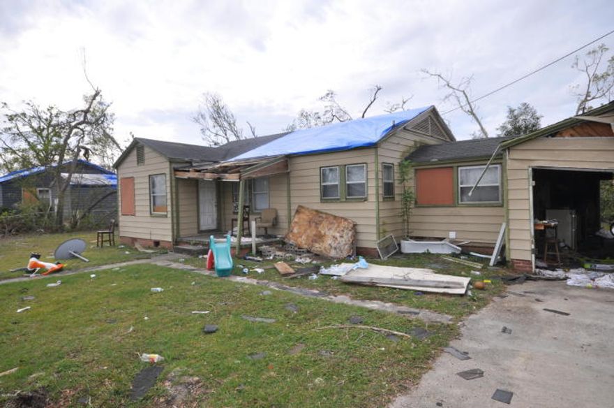 Fixer upper. It does need work from Hurricane damage. Would make a great rental All sizes are approximate. Please measure if important.