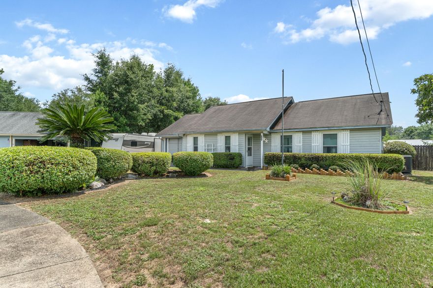 South of I-10! Located in Shoalwood Estates you will love the location. The home is 3 bedrooms with 2 full bathrooms. Numerous recent upgrades have been made such as 2017 new HVAC, 2017 new windows and hurricane panels, Water tank 2019 and new flooring in 2018 for the living room, hall and all three bedrooms. The lot itself is on a Cul de Sac and is over 1/2 acre. A screened porch sets off the dining area to enjoy morning coffee or ??. An above ground pool is partially submerged to allow ease of entry. A metal shed is perfect for lawn tools, etc. There is a workshop in the back yard perfect for projects and crafts or the terrific ''Man Cave'' With all of this and the trees in the back yard there is still plenty of room for play area. The location, condition and price are perfect.