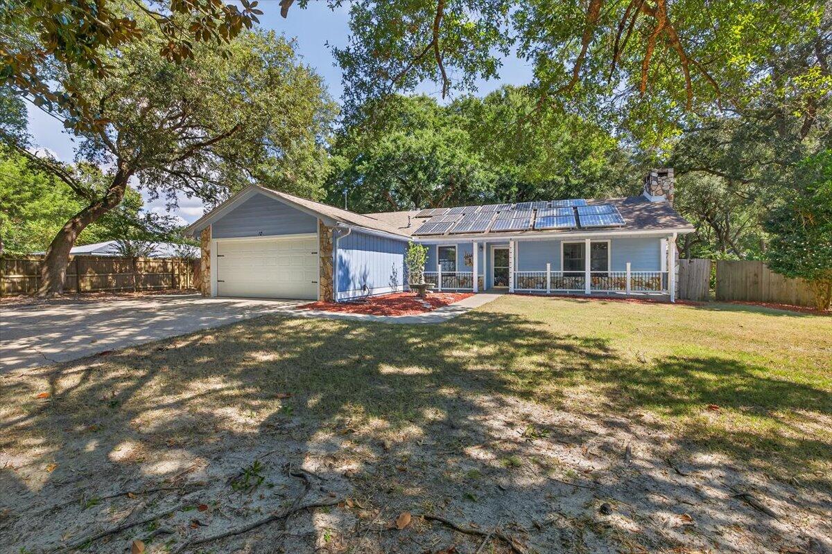 Just Remodeled & Move-In Ready! Come See the Stunning Updates! This charming home offers the perfect blend of comfort and convenience. Located in a quiet cul-de sac in Niceville with no HOA, it features a large, fenced lot with mature trees providing privacy and shade. The oversized yard has ample space for parking your boat or RV. The home has paid off solar panels, an installed EV charger in the 2 car garage, a natural gas tankless hot water heater and a closed loop geothermal heat pump keeping utility bills extremely low. This well-maintained property has an updated kitchen (2012) and boasts two separate living areas, providing a unique opportunity for multi-generational living or flexible use of space. Situated on approximately half an acre with 4 bedrooms, 3.5 baths plus an office, the whole family can work and play comfortably. Situated on approximately half an acre with 4 bedrooms, 3.5 baths plus an office, the whole family can work and play comfortably. Centrally located in Niceville, schools, shopping and beaches are just minutes away. Don't miss out on this fantastic property!