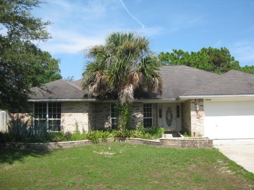 Fantastic home in Holley by the Sea. Great Floor Plan in this 3 Bedroom, 2 Bath, All Brick Home. Landscape Islands in the front, waiting for your green thumb. Large Eat-In Kitchen with Center Island. Extra roomy Laundry Room off Kitchen takes you to the semi-converted Garage. Seller has made a ''Man Cave'' (not included in sq footage)out of half the garage but will re-convert with an acceptable offer if desired. Formal Dining Room, Large Family Room with Cathedral Ceiling. Beautiful Backyard with play area, attached greenhouse and separate dog area. Irrigation, security system, HBTS Rec Center. This has it all! Even RV Hookup. Call to see this property today.Buyer to verify sq footage- taken from property appraiser site.