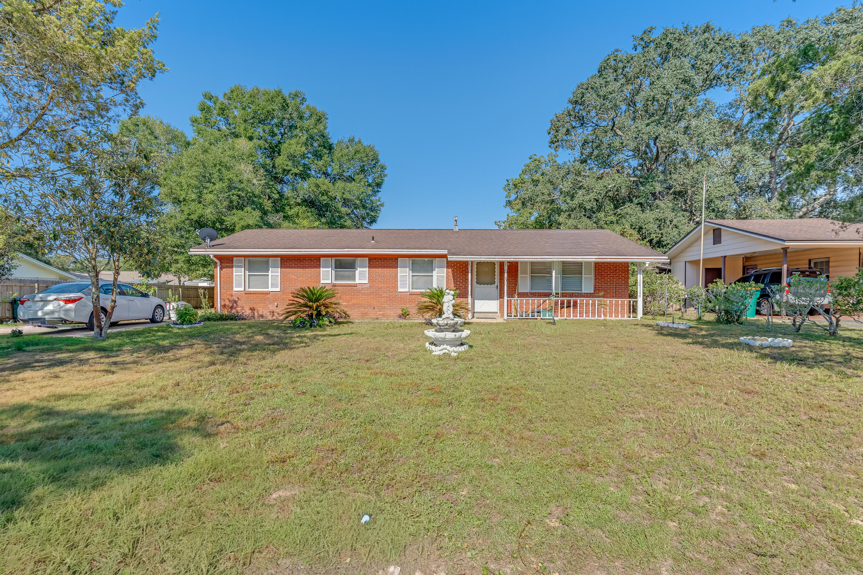 Situated in the lovely Port Dixie neighborhood in Shalimar, this home boasts a prime location without any HOA restrictions. Conveniently located close to shopping, restaurants and entertainment, you'll never be far from where you want to go. This property has been enhanced with various upgrades including a tankless gas water heater, ceramic tile in the main living areas, and is ready for your personal touch. The large privacy fenced-in yard offers plenty of space for all your favorite activities. Stop by today and envision how this could be your perfect dream home.