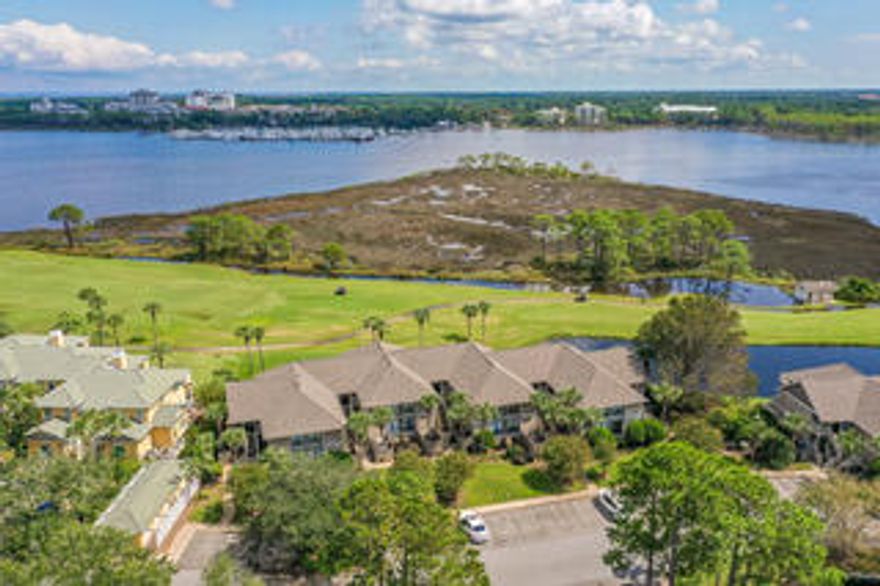 Welcome to this stunning 1 bedroom, 1 bath condo located in the highly sought-after Sandestin Resort in the Harbour Point community.  With its open concept design and sliding glass doors, this home offers breathtaking views of both the lush green golf course and the sparkling blue waters of the Bay and Marina. Imagine waking up every morning to the tranquil beauty of nature right outside your window. The views from this home are truly extraordinary, especially during the rental season when you can enjoy the mesmerizing fireworks display over Baytown Wharf from your own patio. Whether you're relaxing in the living area, dining with friends, or preparing a gourmet meal in the kitchen, you'll always have a front-row seat to the incredible scenery that surrounds you.
