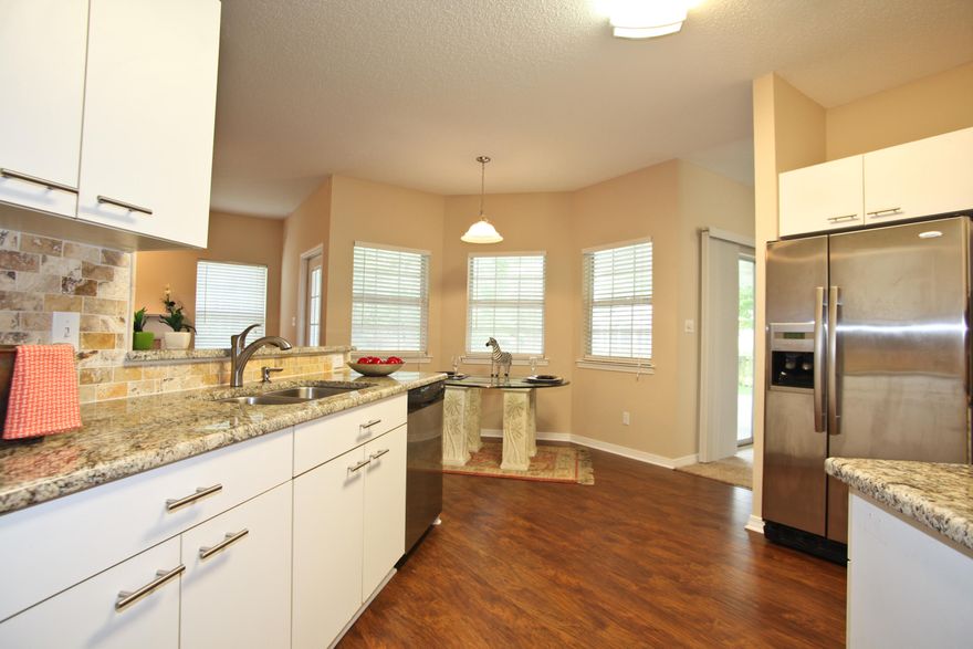 This three bedroom, two bathroom home has undergone many refreshing upgrades. Some of the upgrades done include brand new: carpeting, interior paint, tile, backsplash in the kitchen, stainless steel appliances, granite countertops in the kitchen, and many more. Home also offers a nicely sized screened porch, perfect for entertaining or relaxing in after a long day. ** Note: Required documents from seller located under documents. Please note all highlighted areas. Documents include: Seller Disclosure Information, Personal Interest Addendum, and page 4 and 11. Must be submitted on FARBAR AS IS contract. **