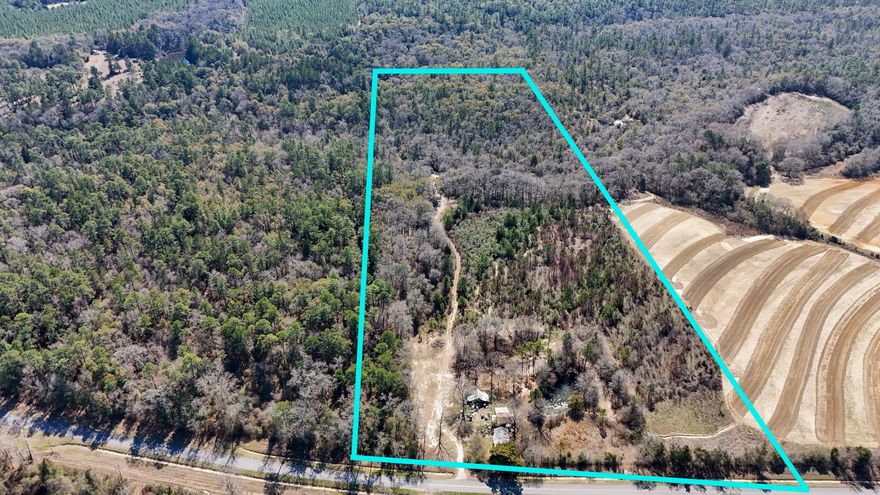 Discover the perfect blend of nature and opportunity with this stunning 37-acre parcel in DeFuniak Springs. This partially cleared land already has utilities in place making it ideal for your dream home or recreational retreat. Meandering through the property is the picturesque Natural Bridge Creek, providing a serene backdrop and abundant wildlife, making this location a haven for hunting enthusiasts. The area is well-known for its rich hunting grounds, ensuring plenty of outdoor adventures right at your doorstep. Zoned for the highly-rated Paxton Schools, this property offers an excellent educational opportunity for families looking to settle in a peaceful community. Whether you're seeking a private oasis or a prime investment, this parcel is a rare find!