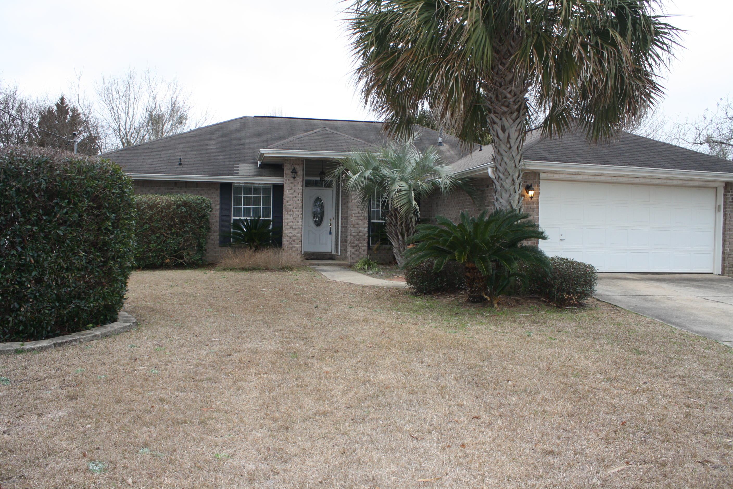In ground pool for this summer! You will love the huge LEVEL backyard and pool in this home. In addition to great outside space, the inside has plenty of room with an office and dining room and heated/cooled sun room in addition to the bedroom count. The living room has vaulted ceilings, fan, plant ledges and is an open floor plan. The kitchen is spacious with breakfast bar, pantry, tile floors, and all appliances. There is also an eat in area attached to the kitchen. The floor plan is a split bedroom with the master boasting double walk in closets, double vanities, linen closet, garden tub, and toilet room. Two additional bedrooms, indoor laundry room and garage nicely round out the home. The sun room is huge, tiled, and opens nicely into the pool area. Come see this one!