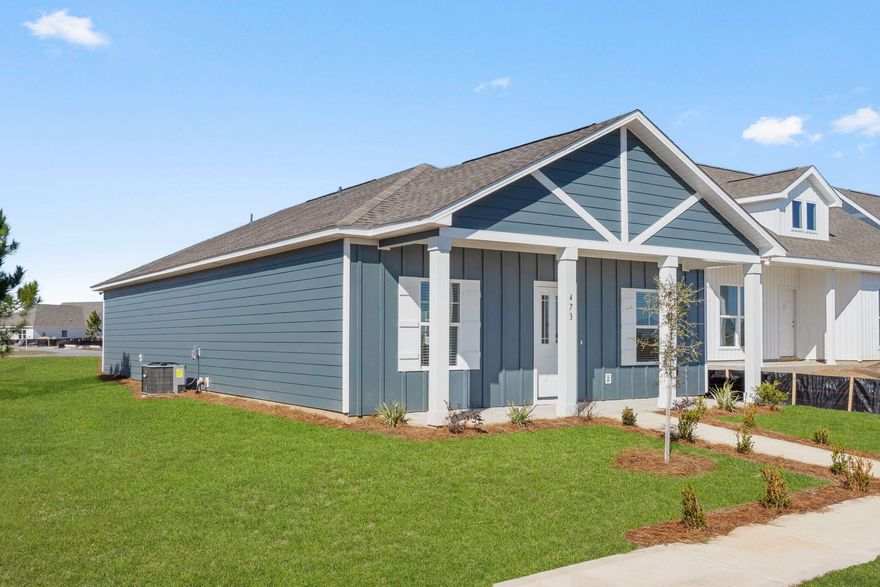 Welcome home to Florida living at its finest. You'll immediately fall in love with the warmth & unparalleled design of our gorgeous open plan home with 3  bedrooms and 2 full baths on one level. Entertaining is a breeze as you and your family and friends gather outside on the Game Day porch which includes a 225 square foot covered porch with exterior wood burning fireplace, fan, electrical & cable outlet. Other included features are granite countertops, hardiplank siding, tray ceilings, and blinds. Located in the growing community of Owl's Head East, your new home provides the convenience of location to many neighboring cities & beaches. The open green space, walking trails, and spring-fed lake complete the ultimate Florida lifestyle.