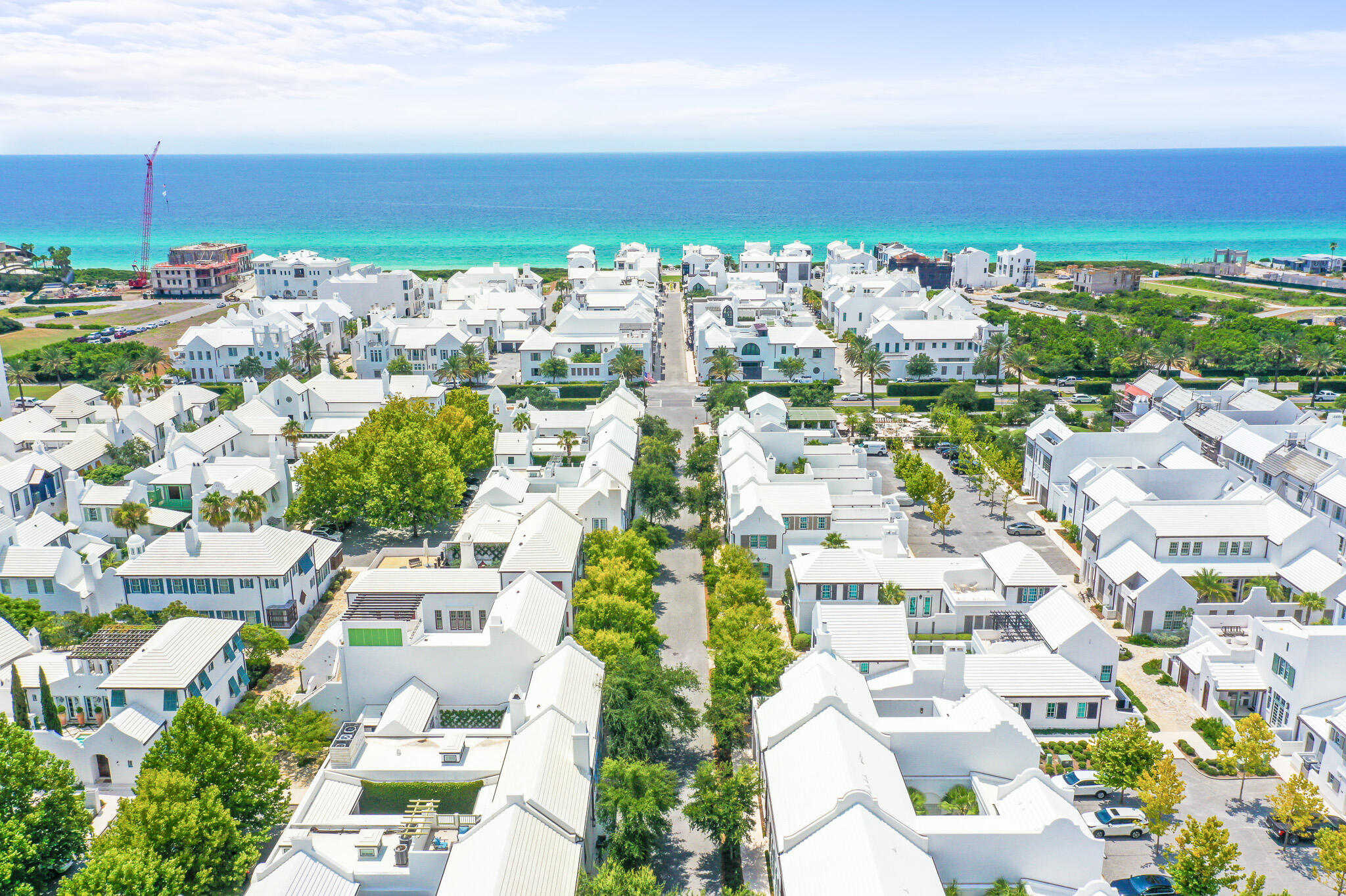 Seize the ''Good Days'' at 86 North Charles Street, where courtyard living meets coastal elegance in this expansive Alys Beach stunner in the heart of the desired east end of 30A. Designed by famed architect Gary Justiss with furnishings by Tracery Interiors, 86 North Charles Street combines melodious rhythms of Bermudian architecture with contemporary style and sophistication and defines indoor/outdoor living. An open floorplan envelops to a private courtyard, perfect for gathering with family or entertaining guests, and allows for twice the living space. Bask in the new-urban aesthetic of the community on the iconic North Charles Street, where winding sidewalks lead from your front door to shopping and dining on the east end of 30A, and the sugary white sands and crystal-clear waters of the Emerald Coast are a stone's throw away.

Upon entering, guests are greeted by a lavish courtyard with natural pebble tile pavers, serene fountain, and outdoor seating. An adjacent sequestered loggia with built in bench leads from the lush courtyard to an open living and dining room, with glass doors that open for wraparound views. Surrounded by soaring ceilings and built in shelving, a grand fireplace centers the living area. This space opens into an oversized kitchen with an island, honed limestone counters, reclaimed red gum cabinets, Dominican Shellstone flooring and a natural sky light. An adjacent shared laundry room and walk-in pantry boasts ample storage. The primary suite is tucked away on the west side of the home; a chic sanctuary attached to a massive primary bathroom, with his and her sinks, a shower, and built-in garden tub. A private guest bedroom with aligning bathroom and courtyard views, as well as a separate half bath are on the east quarters of the main level.

The second level provides three additional guest rooms. A beautifully appointed secondary bedroom with king sized bed and ensuite bathroom, a sizable and comfortable secondary bedroom with queen, and a bedroom with twin over queen bunk beds, all perfect for hosting family and friends. The second floor also includes a separate bathroom with shower. Conveniently, a large outdoor storage closet and outdoor shower sand court are located at the back of the house.

Escape to 86 North Charles Street in Alys Beach, a modern oasis where comfort and luxury infuse with coastal courtyard living.