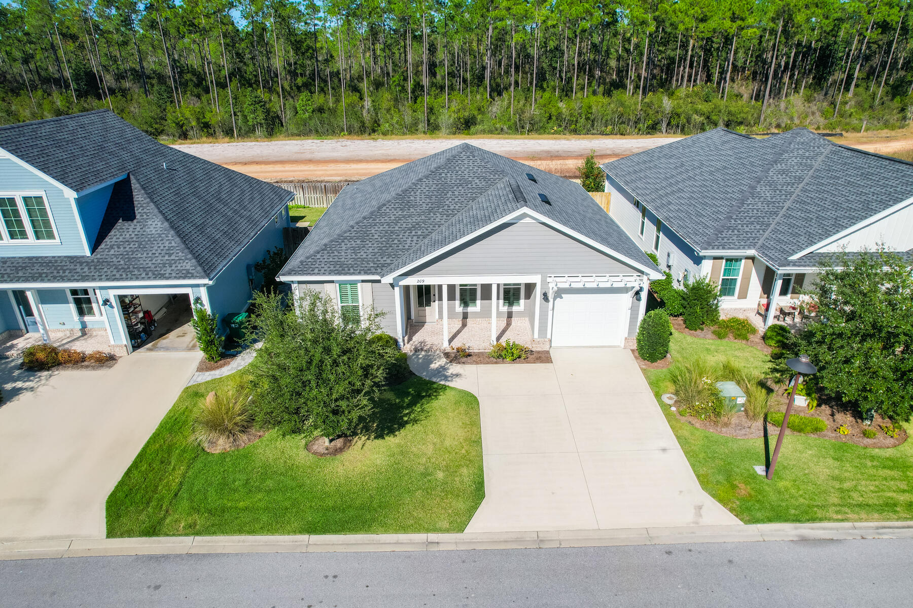 Beautiful Home in Watersound Origins Welcome to Watersound Origins, where coastal living meets modern elegance! The home offers everything you need for comfortable living, including a 1-car garage, a screened back porch, and an open patio area. The privacy-fenced backyard provides the perfect retreat for outdoor relaxation. 9' ceilings throughout, luxury vinyl plank flooring, quartz countertops, stainless steel appliances, washer and dryer hookups only. Watersound Origins offers a wealth of amenities, including a fitness room, community pool, walking and biking trails, and access to Lake Powell for kayaking adventures. Rent includes pest control; tenant is responsible for all utilities and lawncare. - Pets are welcome with a non refundable pet fee of $500.Contact to show!