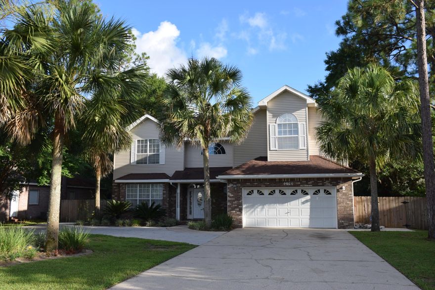 PRICE SLASHED BY MOTIVATED SELLER of a spectacular home that's freshly painted & move-in ready! Spacious classic Huntington home waiting for your door-to-door move! Includes 2 living areas, 2 eating areas, FIVE bedrooms and THREE full baths. Plus a sparkling salt water pool with enough yard left over for a game of volley ball! Welcome your family and friends into the gracious 2-story tiled foyer with its eye-catching turned oak staircase. The openness of the living and dining areas provides flexibility for your furniture placement. The family-friendly kitchen flows into the nook and family room. Polished oak cabinetry, granite counter, a fold-out pantry, and a long center island make this kitchen a workspace you'll actually enjoy! The family room includes a gas log fireplace