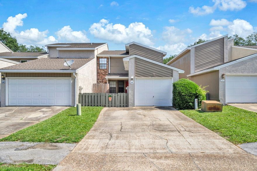 Assumable VA loan 2.75%! Gorgeous 3 bedroom and 2 1/2 bath townhome with 1751 sq ft located close to Hurlburt and Eglin Air Force Bases, the beaches, and great restaurants! Enter the very well-maintained townhome into the foyer and there is a bonus room on the left that may be used for a home office, hobby room or additional bedroom. The living room features a capped fireplace with a mantel, tiled flooring, and large windows overlooking the open deck and large backyard area. The kitchen opens to the dining room and features ample cabinetry! There is a white built in microwave, dishwasher, and slide in stove. The dining room has ship lapped walls, and tile flooring laid on the diagonal! There is also a laundry room and half bathroom downstairs.  Upstairs there is a very large primary bedroom and ensuite bathroom. In addition, there are two guest bedrooms and one full bathroom. The exterior features gutters and a one car garage! 2021-2022 HVAC, 2019 Water Heater. This unit is very close to the community pool! Washer and Dryer to convey. There is a view of the pool from the open deck of the townhome! Buyer to verify all dimensions and information. 