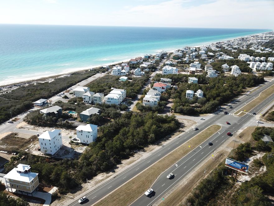 Ocean view parcel is developers' opportunity. This .85 of an acre is just steps to Walton County's largest oceanfront park. Density allows 6 Units with 2nd to 4th floor ocean views. Short walk or bike to famous Rosemary Beach, 30A shops & restaurants, and Camp Helen State Park. Short drive to golf, malls, ECP int'l airport. All utilities are available at the edge of the property.