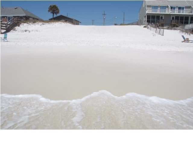 BEAUTIFUL VACANT RESIDENTIAL LOT WITH 117 FEET OF GULF FRONTAGE. ZONING IS INFILL AND ALLOWS 8 UNITS PER AC. IF YOU ARE LOOKING FOR A LEVEL LOT THAT IS PERFECT FOR YOUR BEACH HOME AND GUEST HOUSE, THIS IS IT! ATTN DEVELOPERS: COMBINE THIS LOT WITH THE ONE ADJACENT ON THE WEST AND HAVE OVER AN AC. ON THE GULF...8 TOWNHOMES WITH GARAGES OR A FABULOUS ''ALL PENTHOUSE'' CONDO DEVELOPMENT. DON'T LET THIS OPPORTUNITY GET AWAY!!