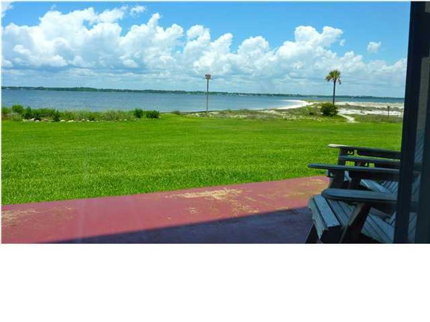 You'll make lots of excuses to stay home and enjoy your backyard oasis in this spacious 1 bedroom/ 1 bathroom condo on Navarre beach. There are gorgeously landscaped gardens with the perfect proportion of shade and sunshine surrounding a sparkling swimming pool and generous space for entertaining guests. Just when you thought it couldn't get any nicer, the inside features an eat-in updated kitchen; spacious bedroom; a and family room;. You may have to leave this idyllic, delightful home every once in a while, but you really won't want to..