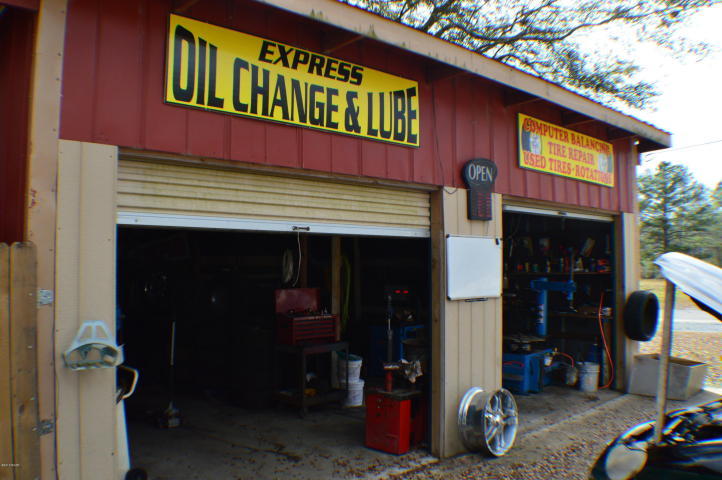 Ready to Start your Own Business? This former Auto mechanic, tire Store and Oil changing facility would be a great place to start. The property Features a 54X26 Metal Building with 14x28 closed in for office with 4 open bays, The Office has 1/2 bath and laminate floors, could be used as office or waiting room. Property is situated on Hwy 79 direct access to Panama City Beach. If you have been considering opening your own business, this location provides unlimited opportunity. All ages, sizes and measurements are approximate. Please verify if important.