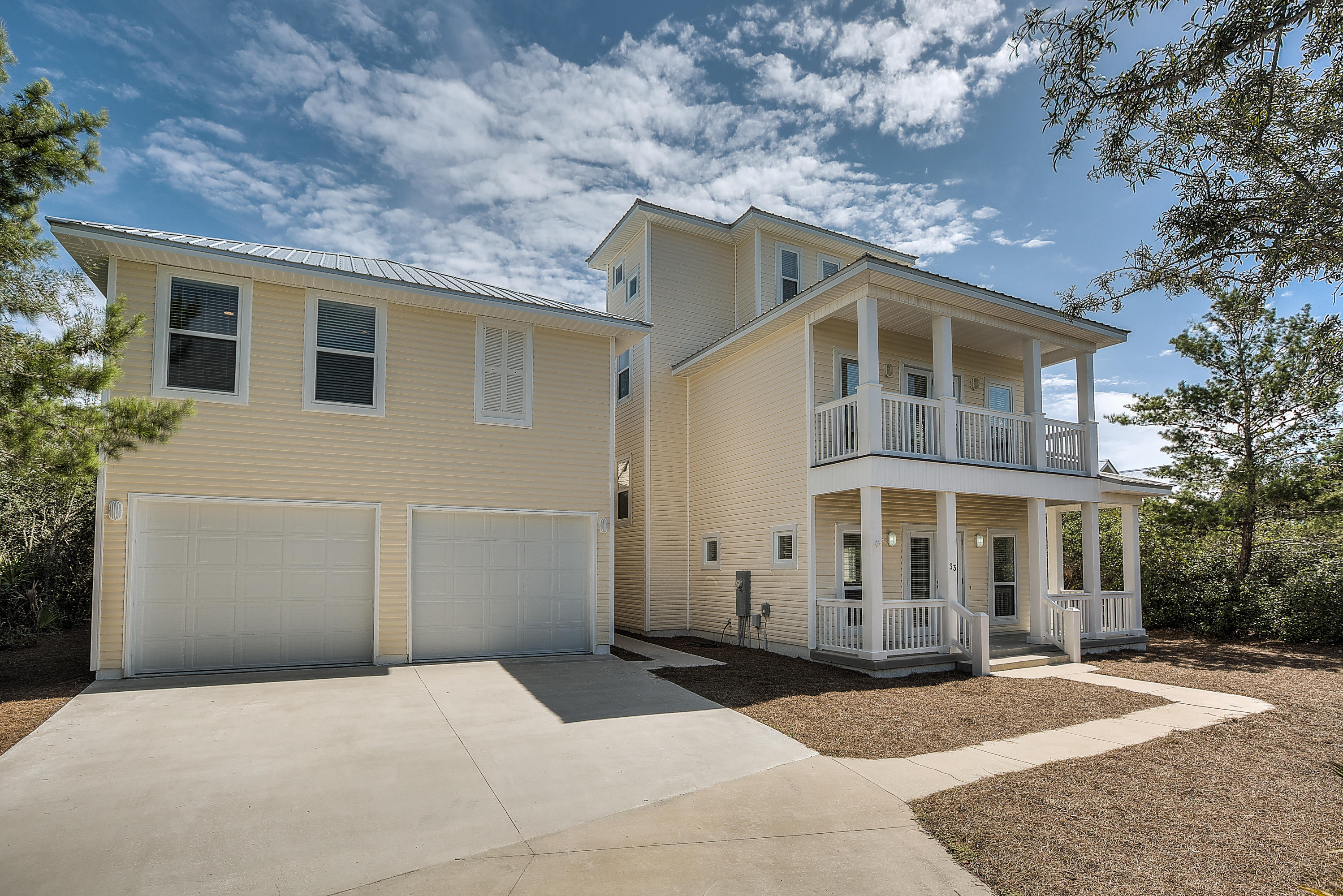 A beautiful, private beach cottage in the Seacrest Beach area. With close proximity to Rosemary Beach & Alys Beach, this home is a must see! The main house features an open floor plan on the first floor. One of the bedrooms is located on the first floor as well with easy access to a beautiful, screened in swimming pool. The second floor features two master sized bedroom and large master bath suite. The third floor is ample sized with a bar, refrigerator, and an amazing deck with surreal gulf views! The carriage house adds additional lock out space with two bedrooms, a living room, and kitchen featuring retro appliances. A work out room with padded floors is located on the first floor & is adjacent to the large two car garage. Private deeded beach access.